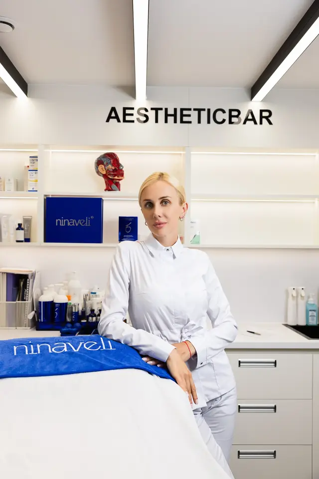 Tetyana Rishko beside the treatment couch